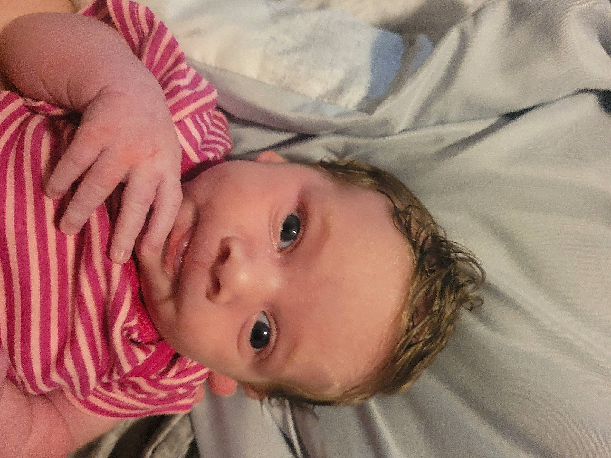 Katarina is registered to the contest to win money with this photo: arm, baby, baby_toddler_clothing, cheek, comfort, eyebrow, eyelash, face, forehead, happy, human_body, iris, lip, mouth, neck, nose, person, plant, shoulder, skin