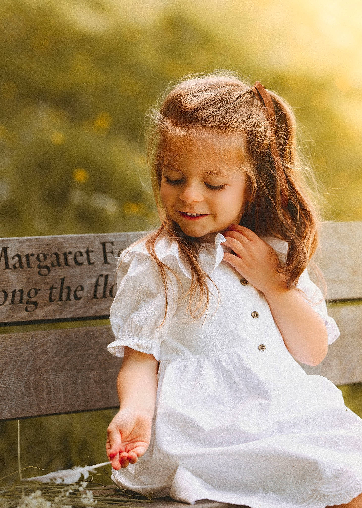 Sarah joined the competition — help win amazing prizes! beauty, blond, brown_hair, child, dress, flash_photography, formal_wear, grass, hair, happy, joy, people_in_nature, person, plant, sitting, skin, smile, summer, sunlight, toddler