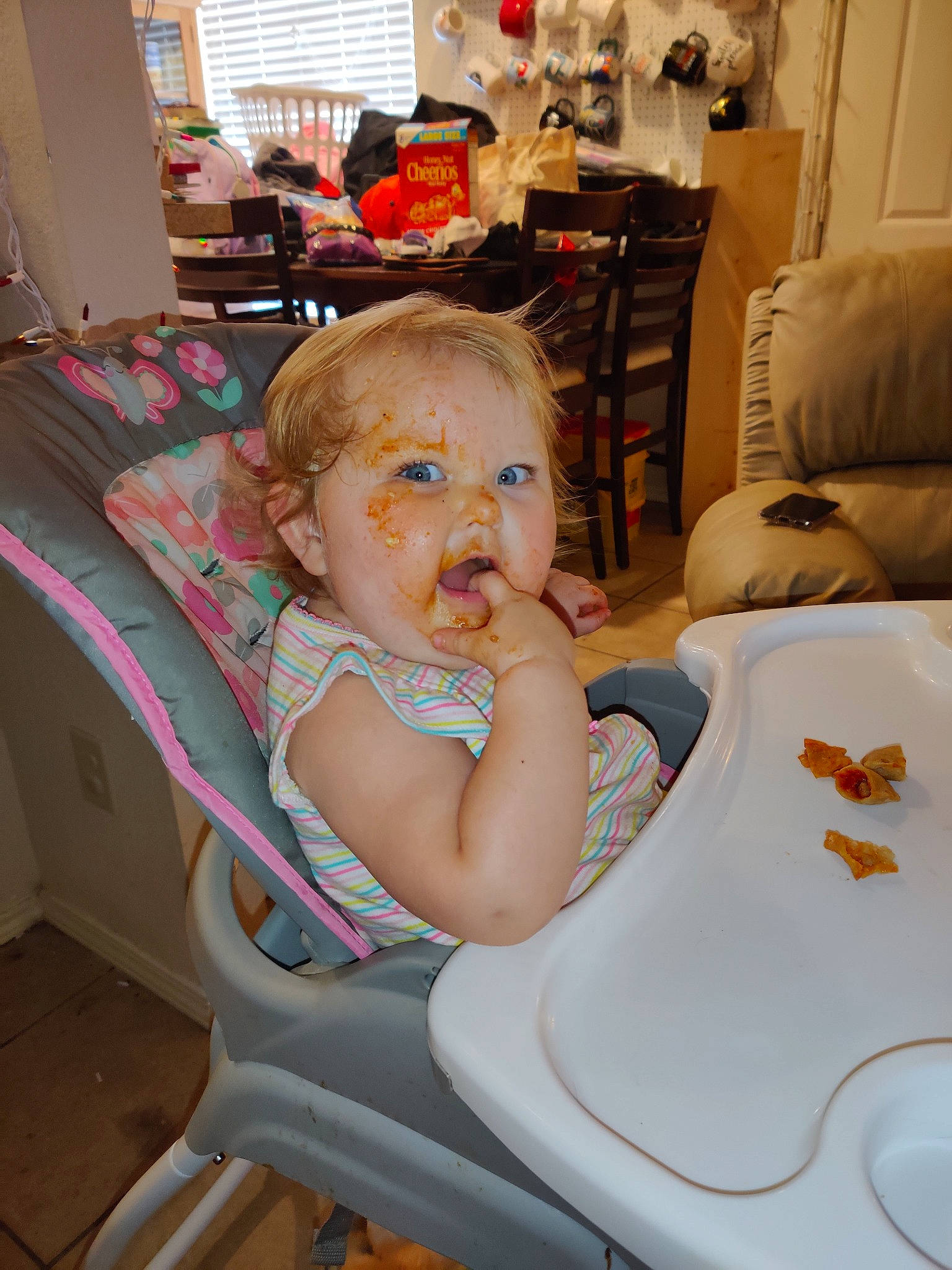 Hensley is registered to the contest to win money with this photo: baby, chair, child, ear, eating, fun, furniture, person, product, sitting, skin, toddler