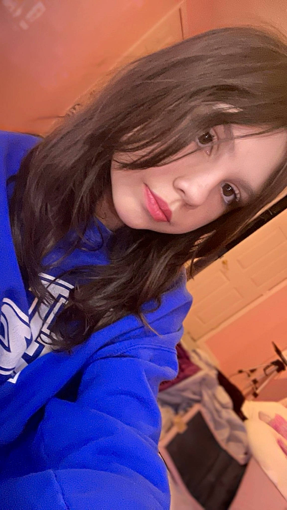 Riley is registered to the contest to win money with this photo: black_hair, cheek, chin, cool, eyebrow, eyelash, face, facial_expression, flash_photography, fun, hair, hairstyle, happy, iris, lip, mouth, nose, person, purple, skin