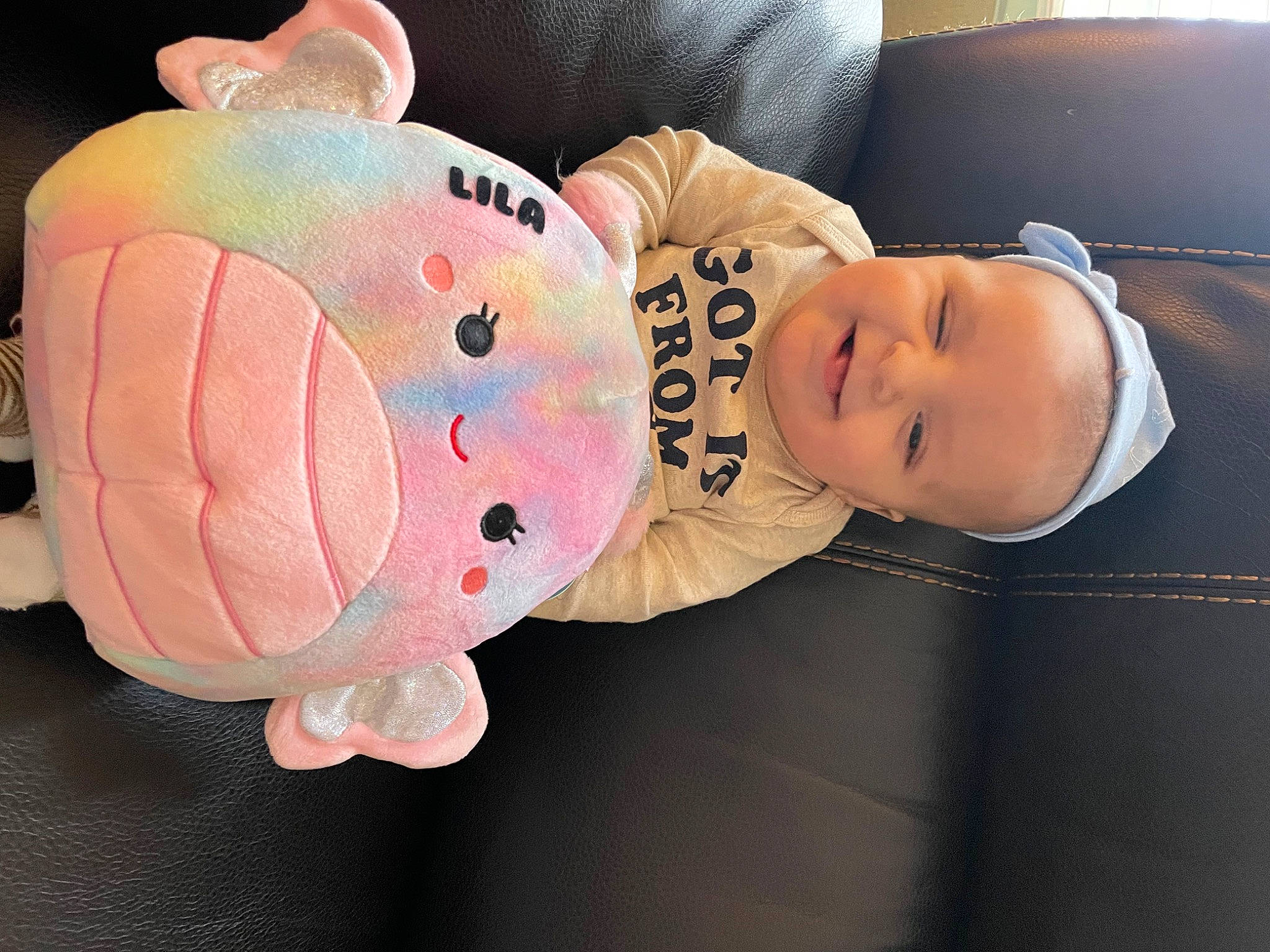 Lila joined the competition — help win amazing prizes! baby, baby_products, baby_safety, baby_toddler_clothing, baby_toys, cheek, child, comfort, happy, headgear, person, plush, sleeve, smile, stuffed_toy, suidae, sweetness, toddler, toy