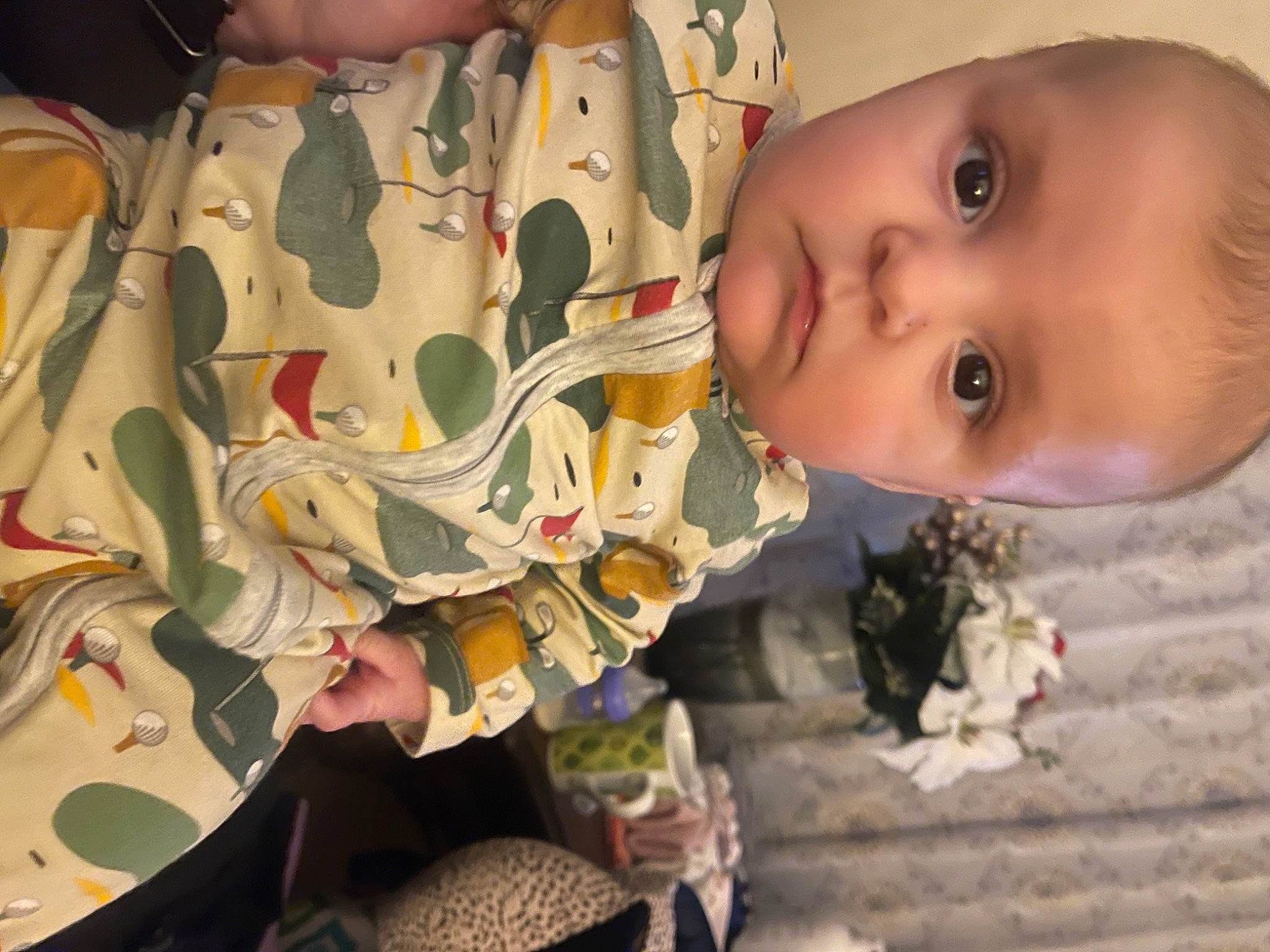 Lila joined the competition — help win amazing prizes! baby, baby_products, baby_toddler_clothing, cheek, child, chin, eyebrow, eyelash, happy, human_body, iris, military_camouflage, neck, nose, pattern, person, sleeve, smile, textile, toddler