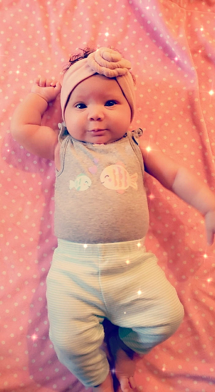 Teagan joined the competition — help win amazing prizes! abdomen, baby, baby_laughing, baby_products, baby_toddler_clothing, baby_toys, cheek, headwear, lip, mouth, nightwear, pattern, peach, person, pink, polka_dot, skin, stomach