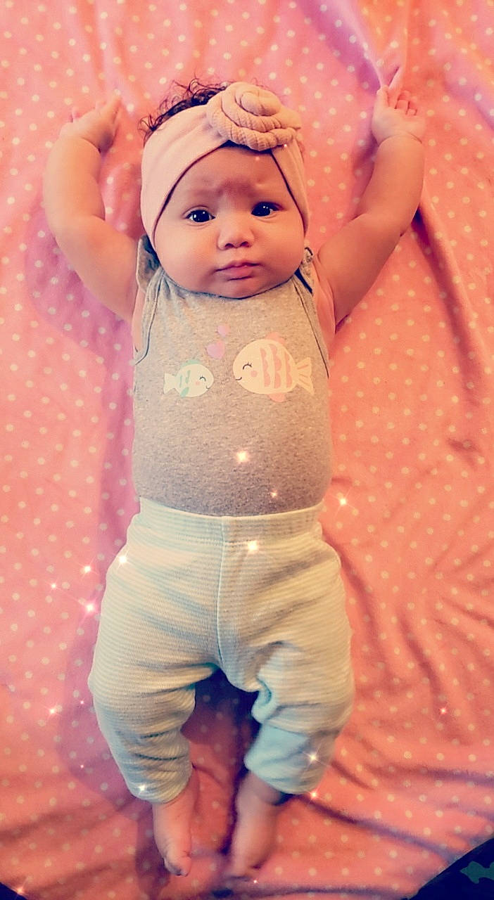 Teagan joined the competition — help win amazing prizes! abdomen, baby, baby_products, baby_toddler_clothing, cheek, child, foot, headband, headwear, joint, peach, person, pink, polka_dot, skin, stomach, toddler
