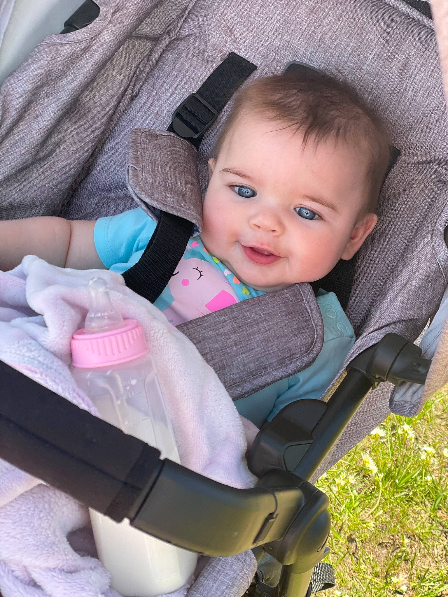 Sara is registered to the contest to win money with this photo: auto_part, baby, baby_carriage, baby_products, baby_safety, baby_toddler_clothing, beauty, car_seat, chair, cheek, child, comfort, eye, fashion_accessory, hat, person, product, sitting, sleeve, smile