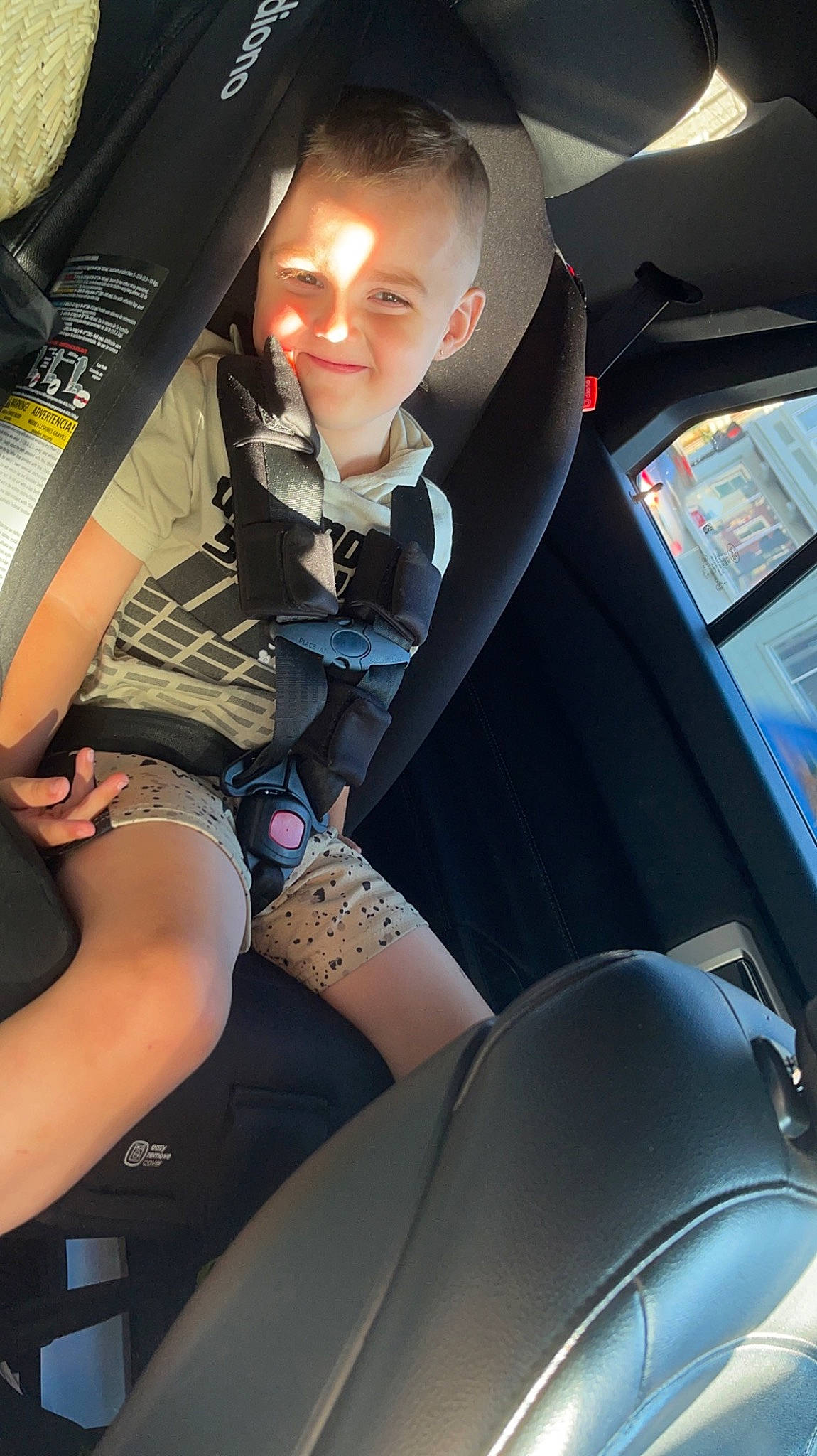 Preston is registered to the contest to win money with this photo: auto_part, automotive_design, automotive_exterior, automotive_wheel_system, car, car_seat, car_seat_cover, head_restraint, human_leg, joy, mode_of_transport, motor_vehicle, person, personal_luxury_car, seat_belt, smile, steering_part, steering_wheel, thigh, vehicle