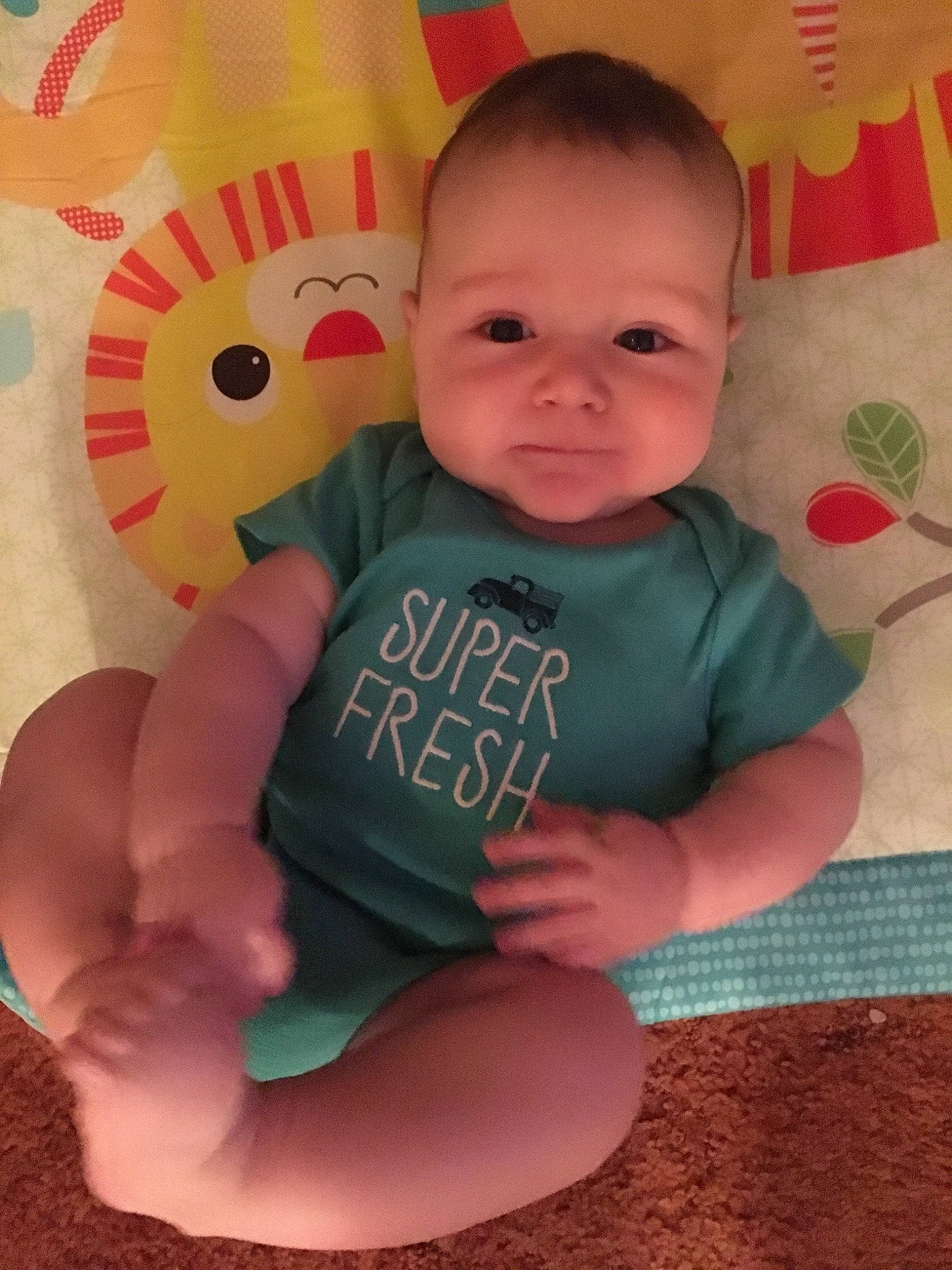 Maximus is registered to the contest to win money with this photo: arm, baby, baby_products, baby_toddler_clothing, cheek, child, face, forehead, fun, head, leg, lip, person, play, product, skin, smile, toddler