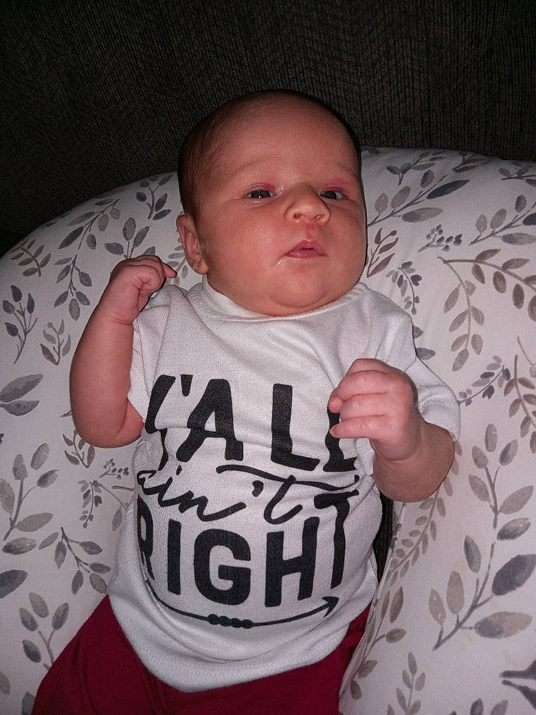 Bristol joined the competition — help win amazing prizes! arm, baby, baby_toddler_clothing, cheek, child, comfort, cool, finger, hand, human_body, linens, mammal, mouth, person, skin, sleeve, t_shirt, textile, thumb, toddler