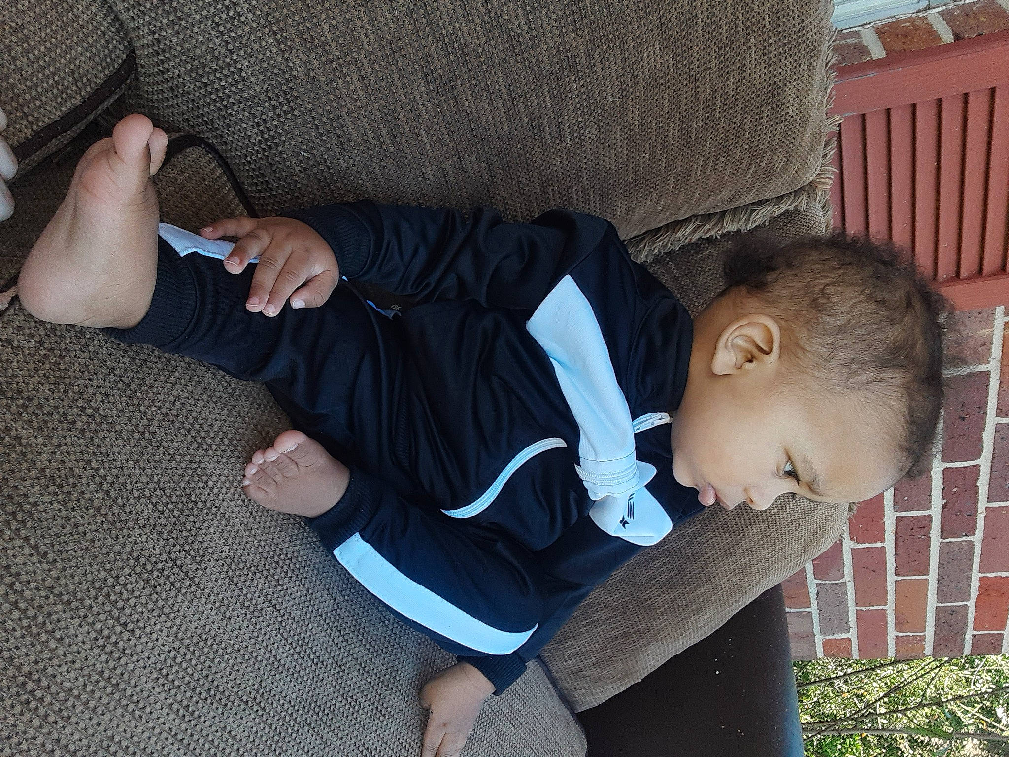 Ethan joined the competition — help win amazing prizes! baby, baby_toddler_clothing, child, comfort, elbow, finger, foot, fun, grass, human_leg, joint, knee, lap, leg, person, sitting, sock, thigh, thumb, toddler