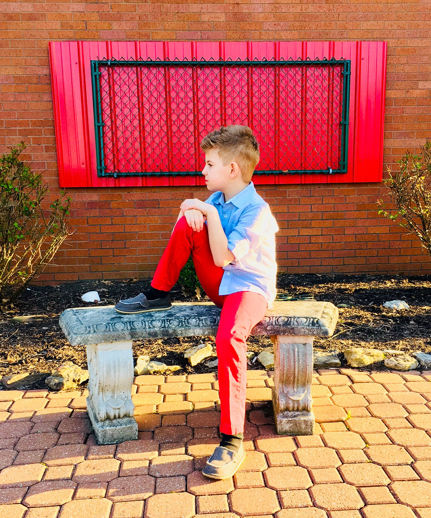Erik joined the competition — help win amazing prizes! bench, brick, brickwork, electric_blue, fun, grass, happy, leisure, orange, outdoor_furniture, people_in_nature, person, plant, road_surface, sitting, standing, summer, tints_and_shades, toddler, wall