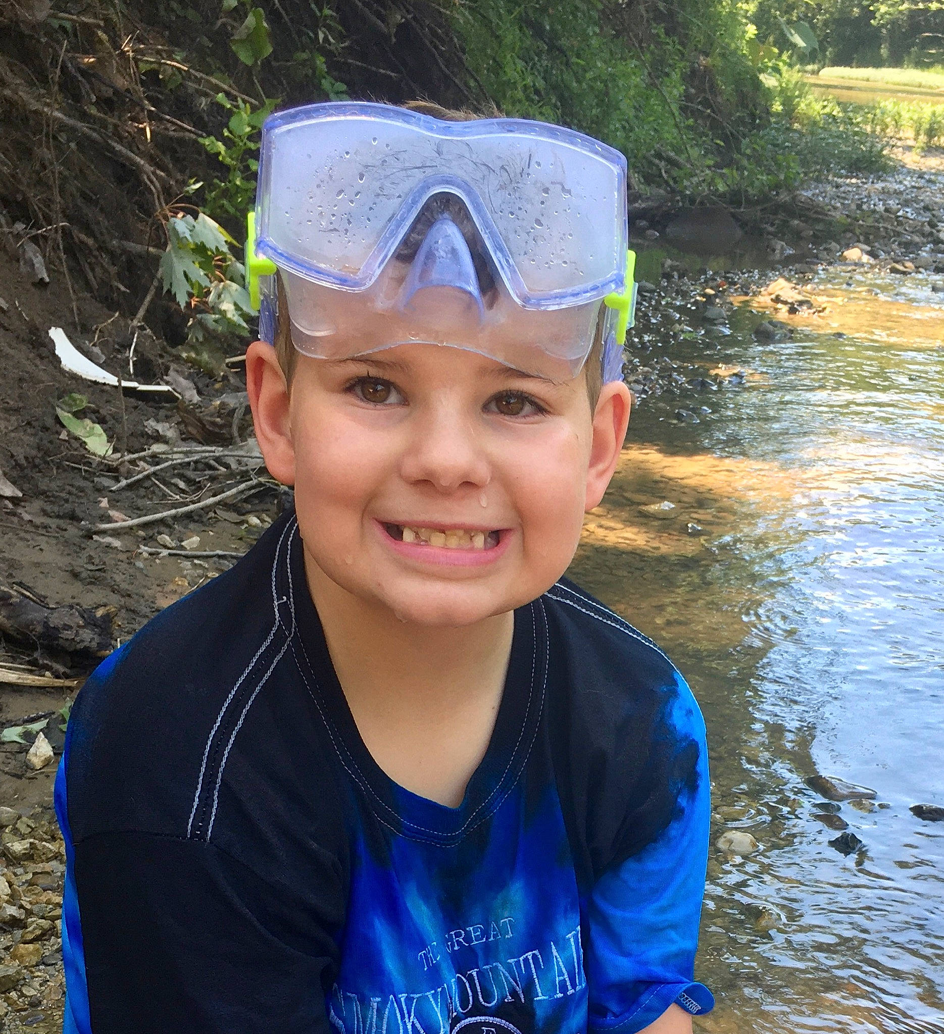 Erik joined the competition — help win amazing prizes! cap, child, fun, happy, headgear, headwear, joy, leisure, mud, person, personal_protective_equipment, photography, recreation, smile, vacation, water