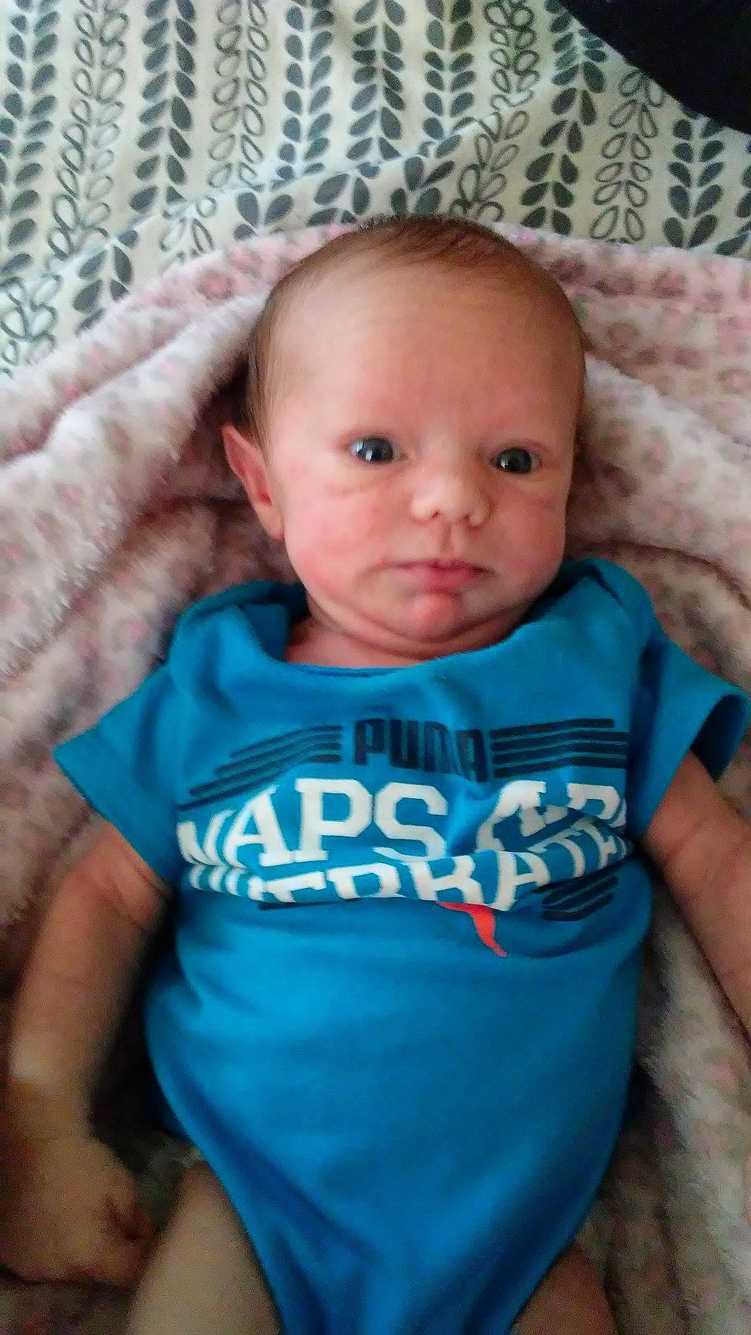 Karen is registered to the contest to win money with this photo: arm, blue, boy, cheek, child, cool, day, eye, finger, fun, hand, head, infant, iris, mouth, person, product, sitting, skin, smile