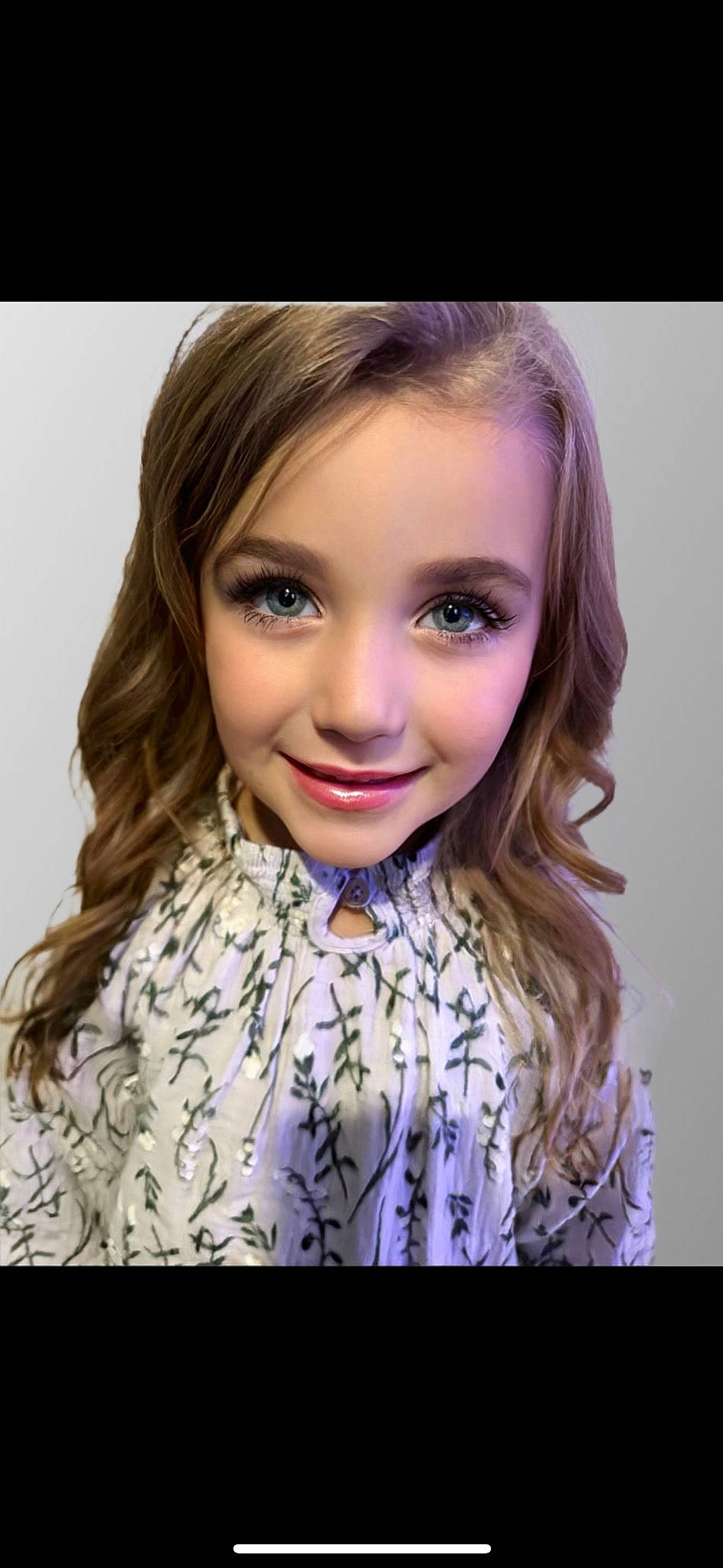 Zoey is registered to the contest to win money with this photo: bangs, beauty, blond, cheek, electric_blue, eyelash, face, fashion_design, flash_photography, happy, iris, joy, layered_hair, lip, long_hair, magenta, makeover, outerwear, person, purple