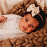 Kataleya joined the competition — help win amazing prizes! baby, infant, blanket, headband, bow, cute, face, eyes, skin, knit_blanket, texture, cozy, portrait, child, newborn, soft, closeup, laying, indoors, warm