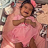 Kataleya joined the competition — help win amazing prizes! baby, infant, girl, pink_dress, headband, flower, smiling, laughing, blanket, polka_dots, stuffed_toy, nursery, crib, soft_toys, clothing, happy, child, cute, portrait, indoors
