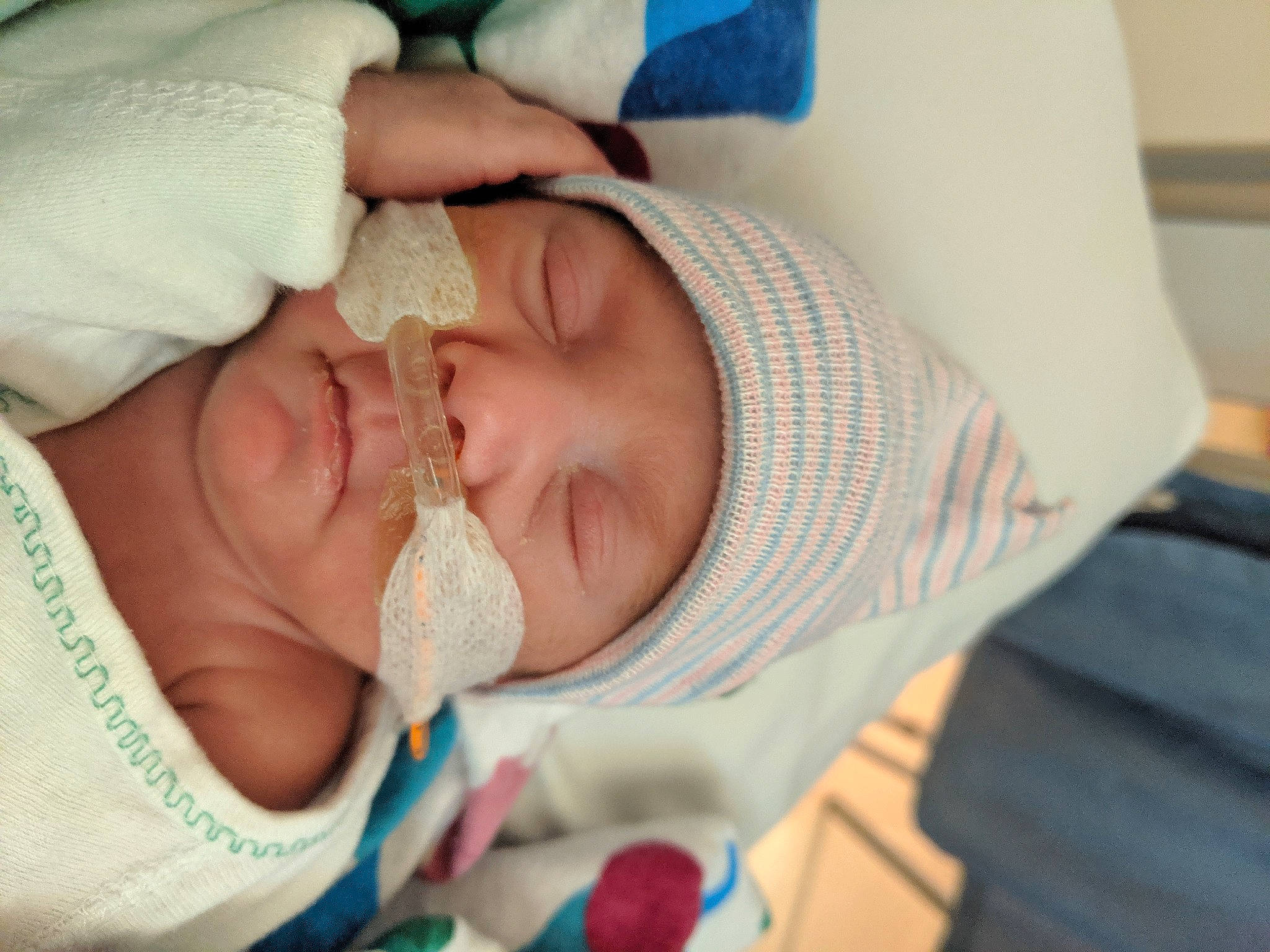 Ariana is registered to the contest to win money with this photo: baby, baby_sleeping, birth, cheek, child, childbirth, ear, eye, hand, headwear, mouth, nap, nose, person, room, skin, sleep, toddler