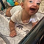 Malakaii joined the competition — help win amazing prizes! baby, smiling, crib, toy, toy_crab, happy, infant, child, mattress, patterned, crawling, white_clothing, bedroom, cute, small_hands, face, eyes, cheerful, indoor, young_child