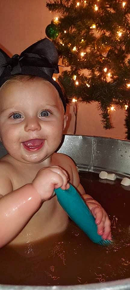 Makenzie is registered to the contest to win money with this photo: baby, bathing, eye, finger, fun, hair, hairstyle, hand, happy, head, human_body, iris, joy, lip, mouth, nose, person, photograph, skin, smile