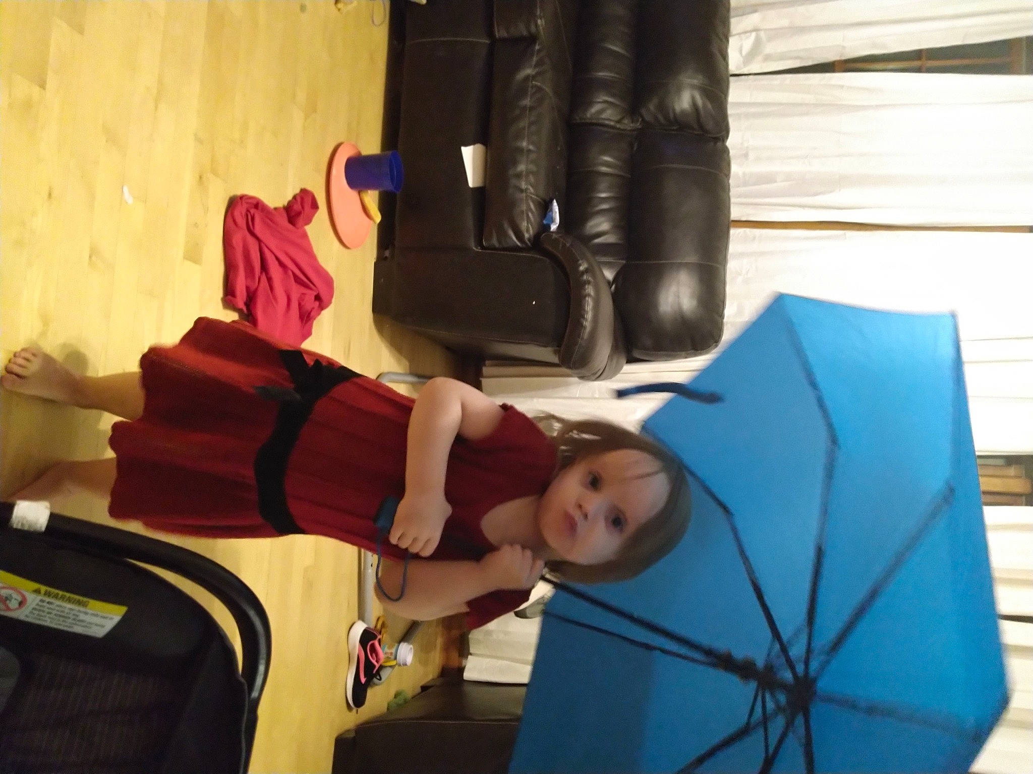 Lucy is registered to the contest to win money with this photo: arm, bag, comfort, couch, elbow, finger, fun, glove, hat, human_body, human_leg, knee, leg, leisure, luggage_and_bags, person, shorts, t_shirt, textile, thigh