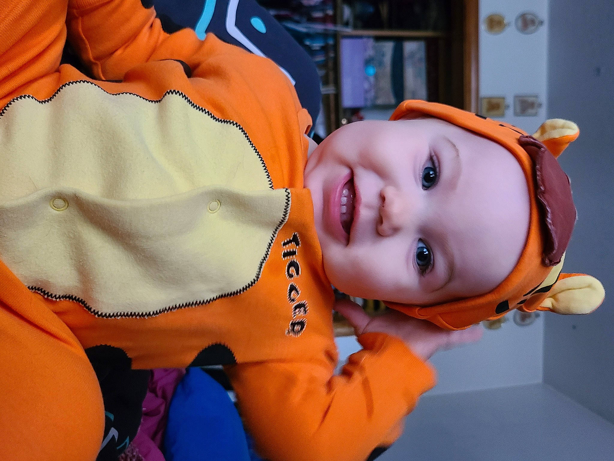 Kathryn joined the competition — help win amazing prizes! baby, baby_products, cheek, child, comfort, eye, eyelash, fun, happy, headgear, headwear, leisure, mouth, nose, orange, people, person, personal_protective_equipment, room, smile