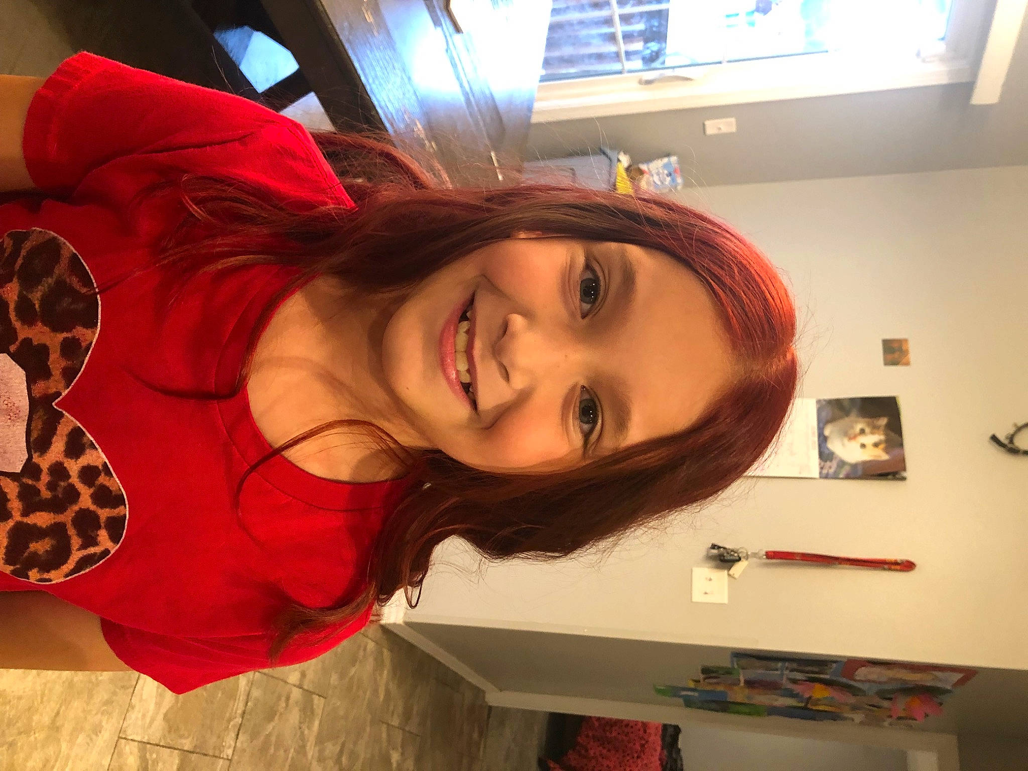 Kayleigh is registered to the contest to win money with this photo: bangs, beauty, black_hair, brown_hair, child, display_device, facial_expression, fun, happy, human_body, human_leg, joy, long_hair, mouth, nose, person, picture_frame, room, selfie, skin