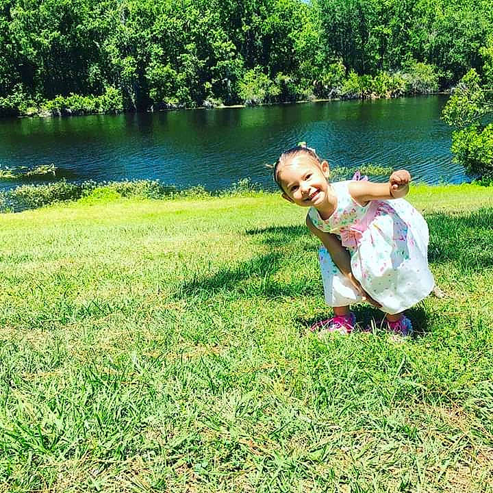 Heavenly Serenity Taber joined the competition — help win amazing prizes! bank, botany, child, dress, grass, green, happy, joy, lake, lawn, people_in_nature, person, photography, plant, pond, recreation, river, smile, summer, tree