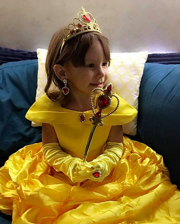 Heavenly Serenity Taber is registered to the contest to win money with this photo: hair_accessory, hairstyle, headpiece, long_hair, person, yellow