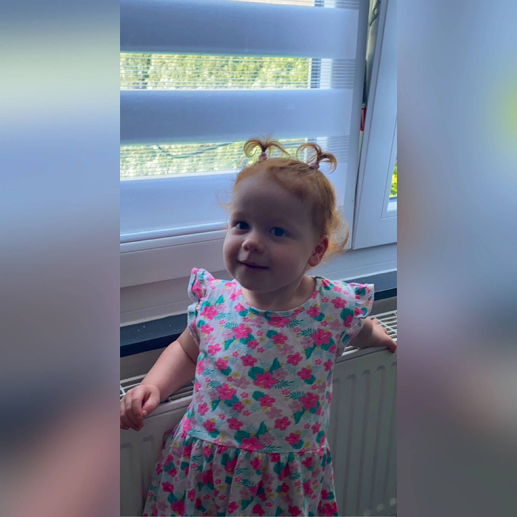 Ilyanna participe au concours pour gagner de l'argent avec cette photo : azure, baby, baby_toddler_clothing, child, day_dress, dress, electric_blue, fun, happy, joy, magenta, one_piece_garment, pattern, person, sky, sleeve, smile, toddler, window