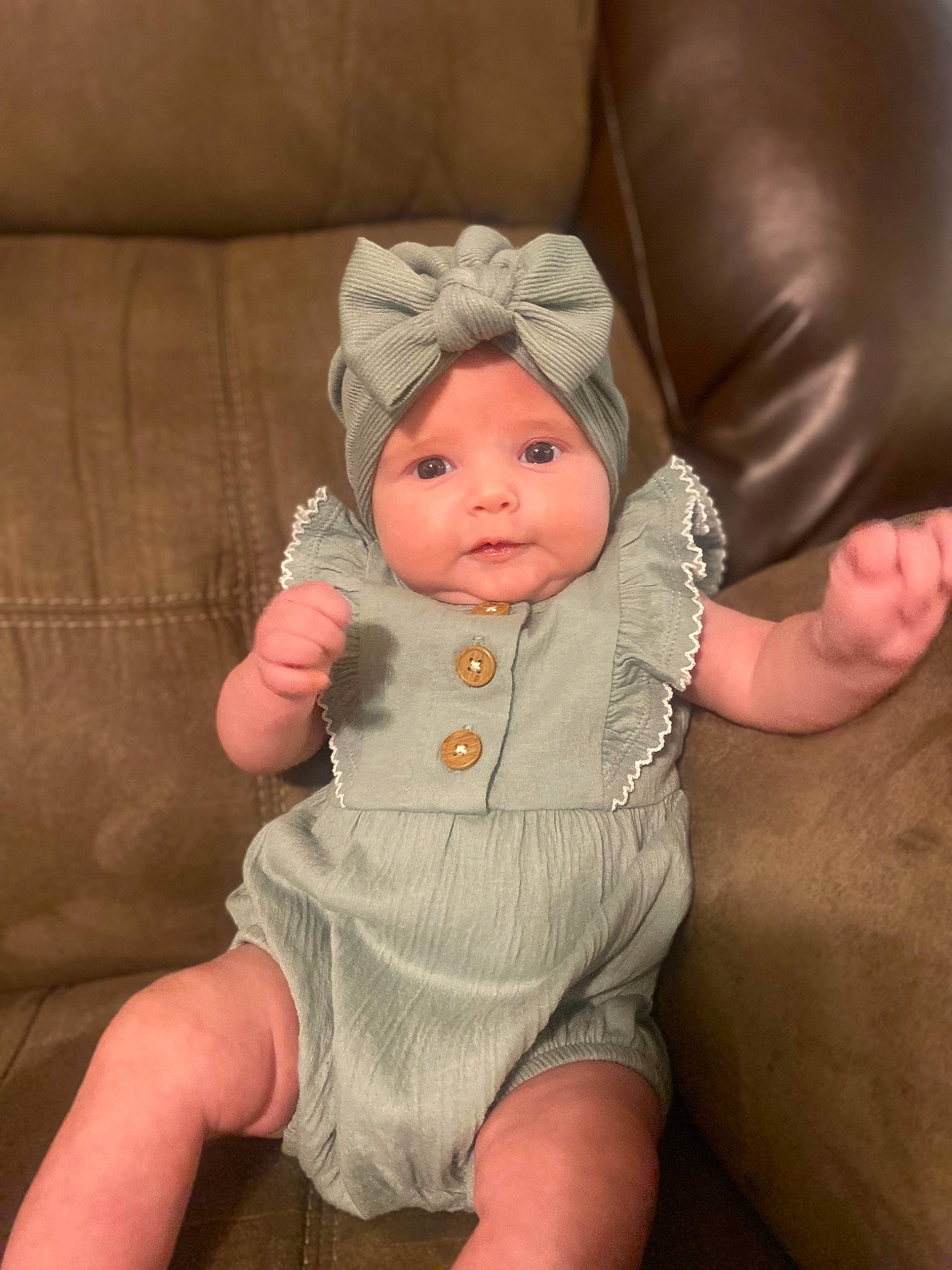 Oaklee joined the competition — help win amazing prizes! baby, baby_products, baby_toddler_clothing, cheek, chin, comfort, eye, face, finger, gesture, head, headwear, human_body, iris, lip, nail, nose, person, personal_protective_equipment, sleeve