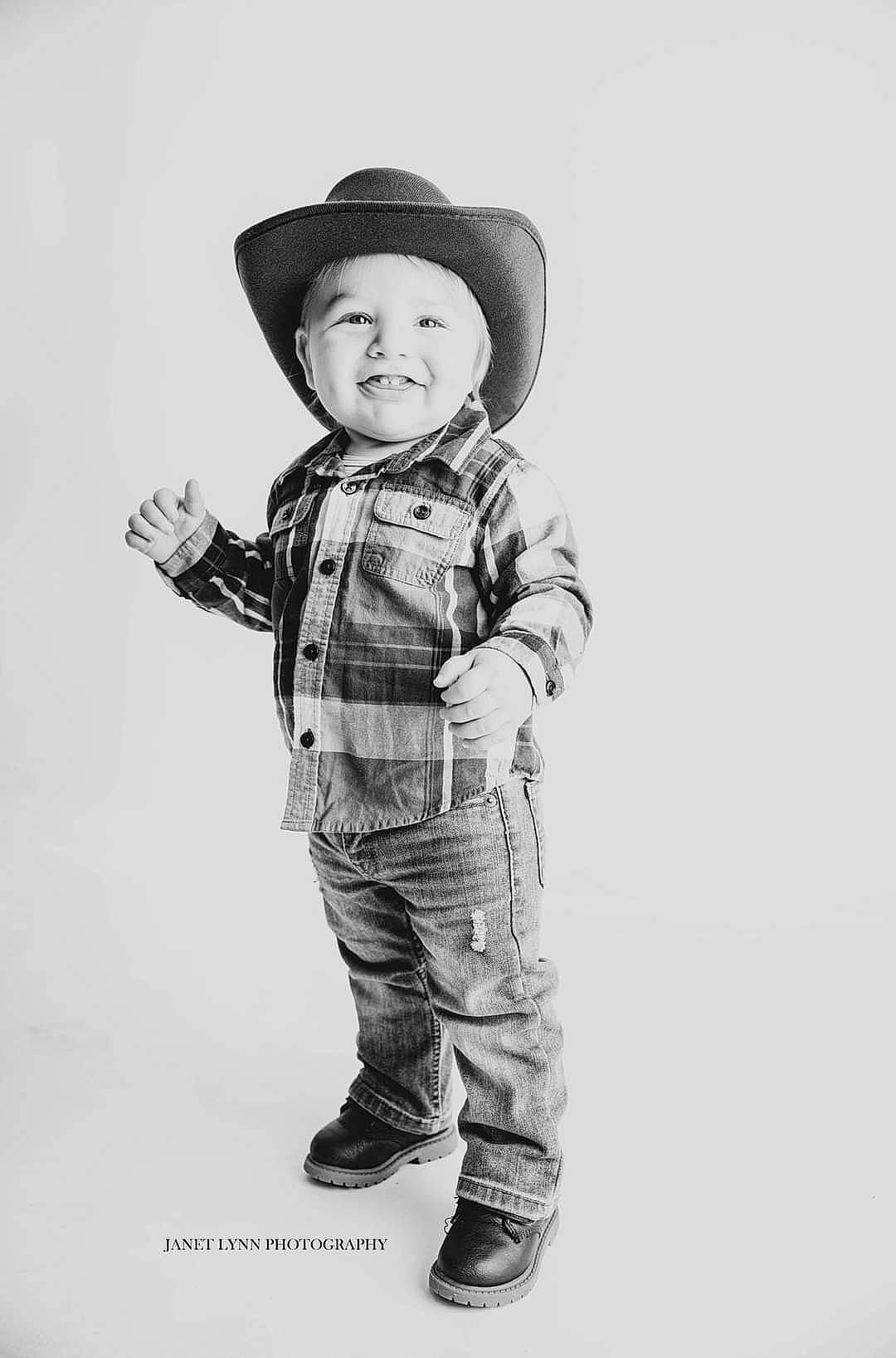 Brantlee joined the competition — help win amazing prizes! baby, baby_toddler_clothing, cap, child, collar, costume_hat, fashion_accessory, flash_photography, gesture, happy, hat, headwear, joy, monochrome, monochrome_photography, outerwear, pattern, person, portrait_photography, sleeve