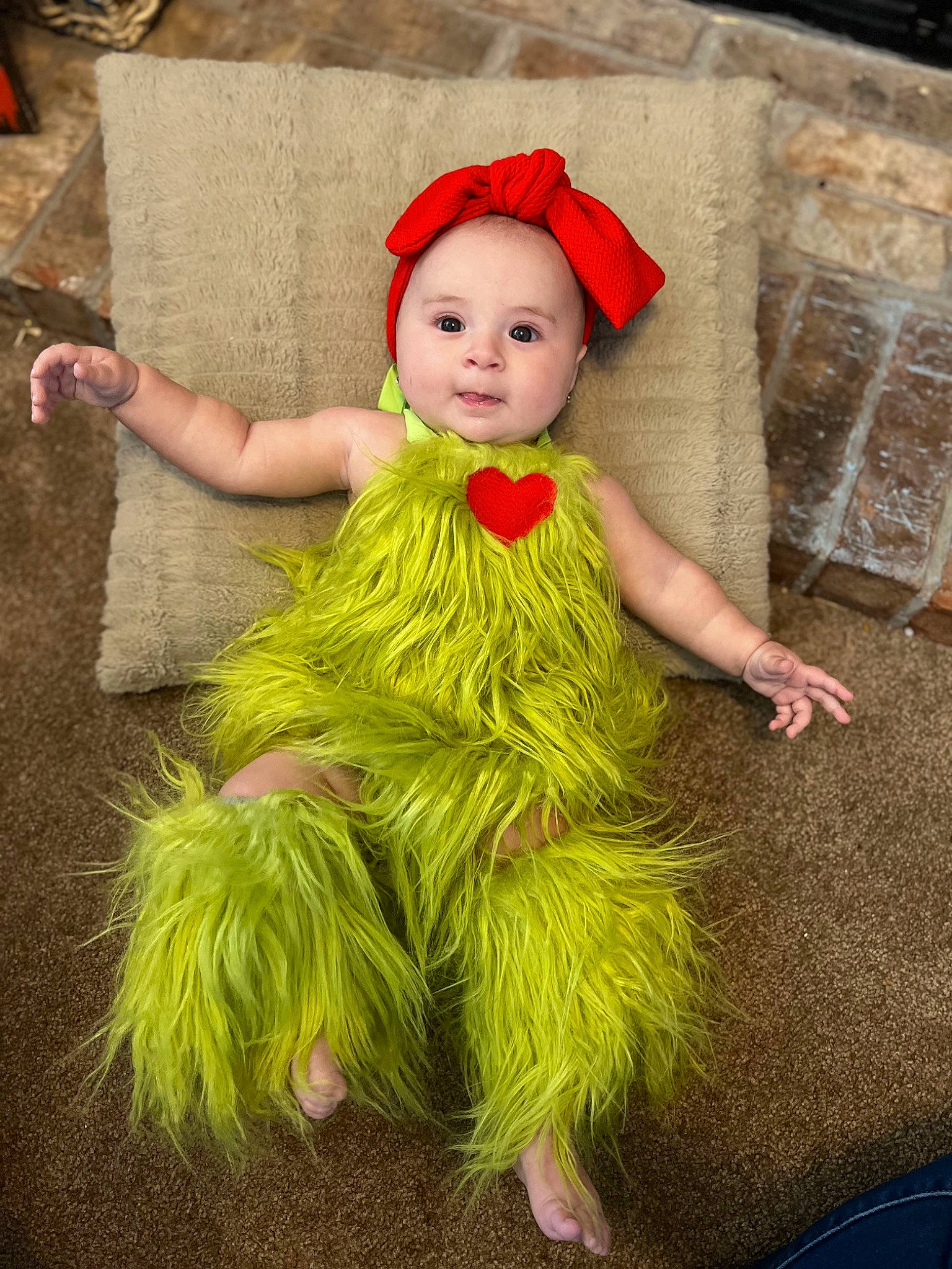 Hollis joined the competition — help win amazing prizes! baby, baby_toddler_clothing, child, costume, costume_hat, day_dress, eye, fashion_design, fun, grass, happy, hat, headpiece, magenta, peach, person, plant, sitting, toddler, vacation