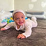baby, smiling, infant, pajamas, hat, carpet, lying_down, indoor, cute, happy, child, portrait, soft_texture, blanket, pillow, cozy, home, bright_eyes, toddler, sleepwear