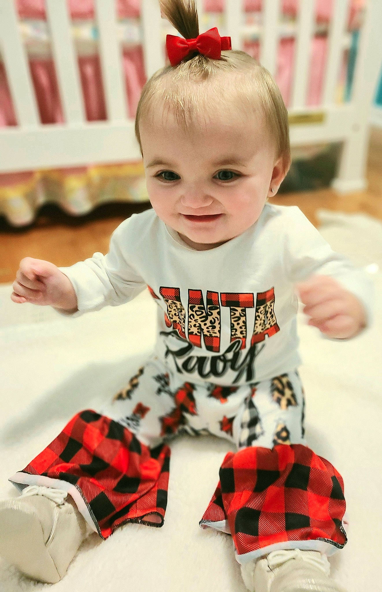 Ellie Mae is registered to the contest to win money with this photo: baby, baby_toddler_clothing, black, child, collar, fashion, happy, joy, orange, organ, pattern, person, photograph, pink, plaid, red, sleeve, smile, t_shirt, tartan