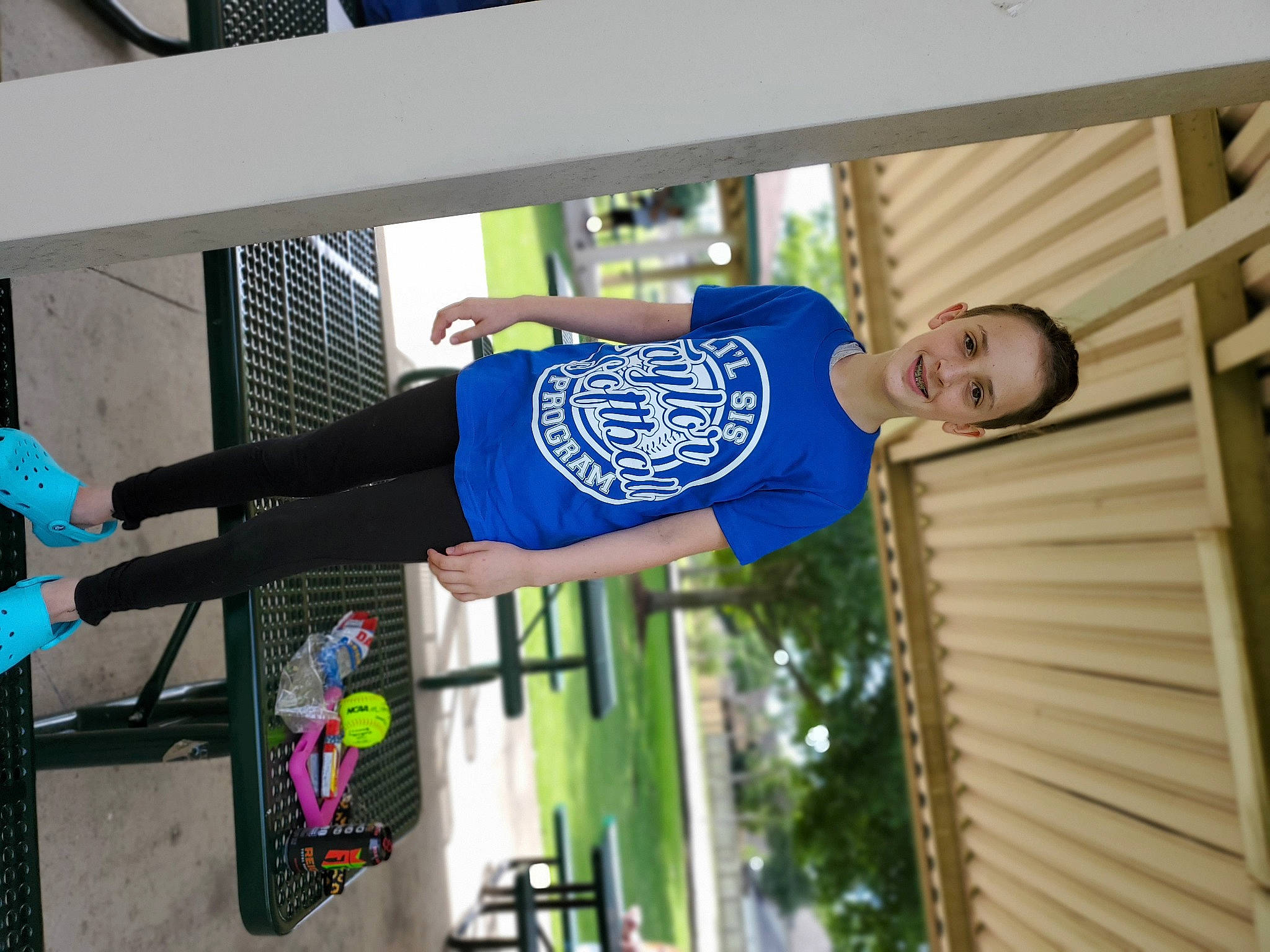 Kaelyn is registered to the contest to win money with this photo: joy, person, t_shirt, window