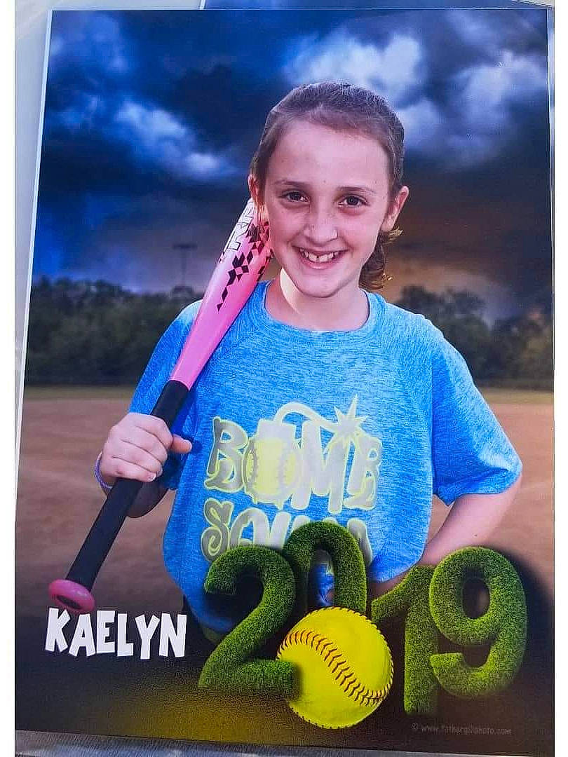 Kaelyn is registered to the contest to win money with this photo: ball, child, joy, person, photography, play, smile, softball, stock_photography, t_shirt