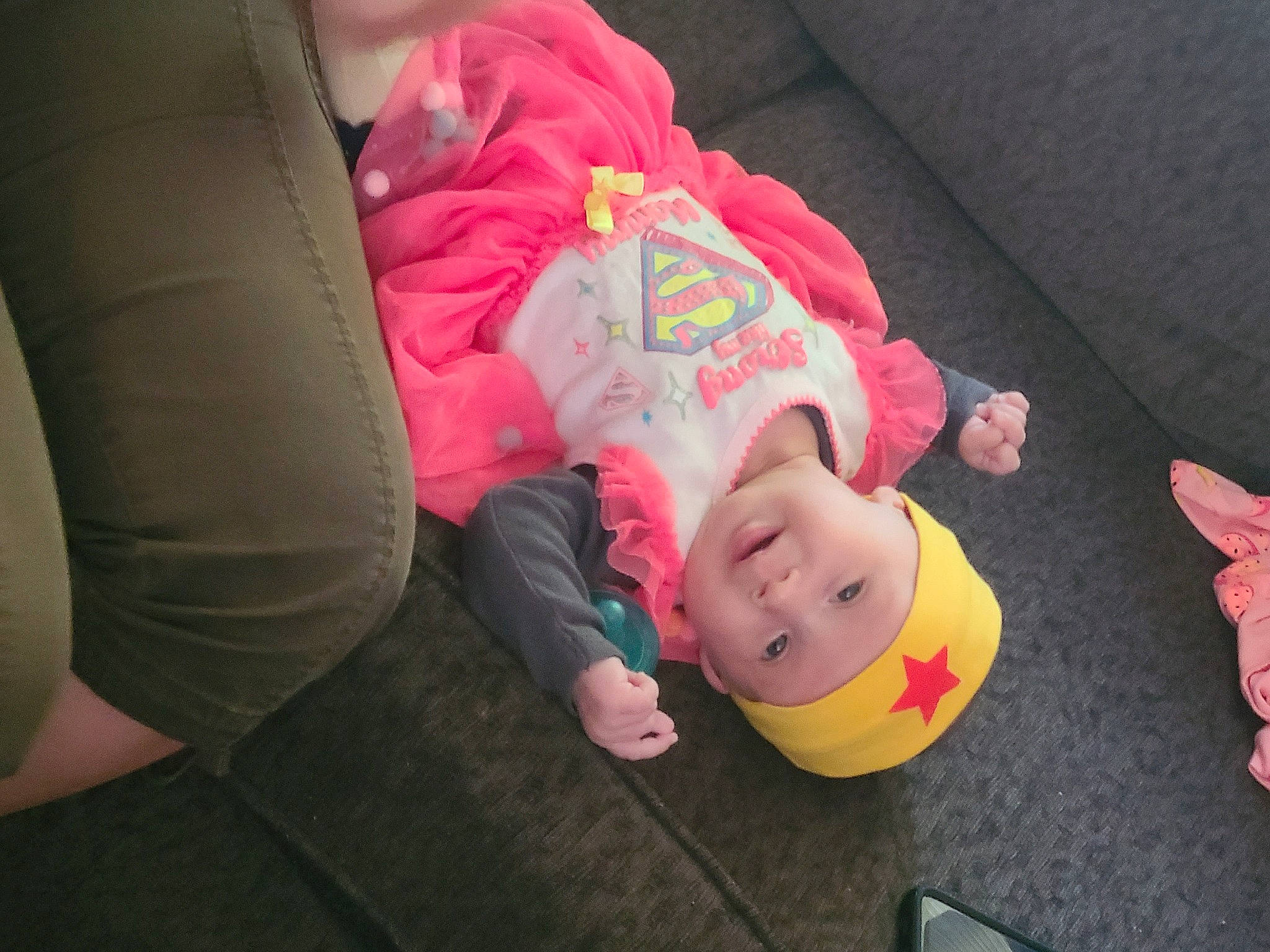 Jayda joined the competition — help win amazing prizes! baby, baby_products, baby_toddler_clothing, cheek, child, comfort, flooring, foot, fun, grass, headwear, human_leg, knee, lap, mobile_phone, person, sitting, thigh, toddler, toy