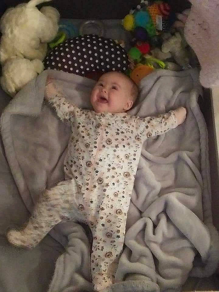 Gwendolyn is registered to the contest to win money with this photo: baby, baby_products, bedtime, blanket, child, person, product, sleep, smile, toddler