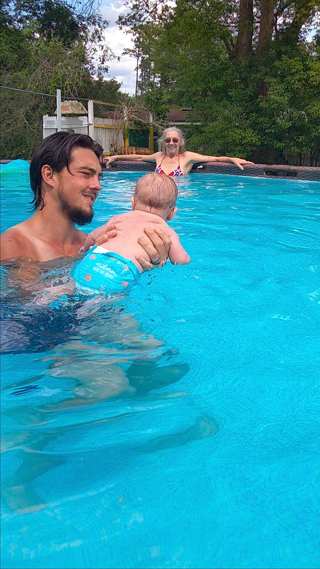 Alora is registered to the contest to win money with this photo: aqua, barechested, bathing, blue, chest, event, fun, happy, indoor_games_and_sports, joy, leisure, leisure_centre, nonbuilding_structure, person, plant, recreation, resort_town, smile, sports, swimming_pool