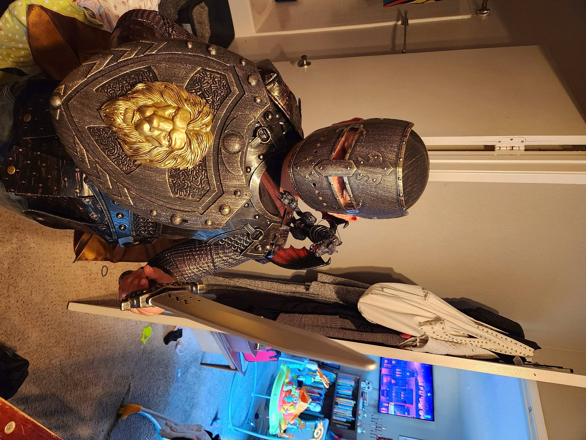 Deklend is registered to the contest to win money with this photo: armour, art, automotive_design, carmine, ceiling, collection, fashion_accessory, hat, helmet, machine, metal, person, personal_protective_equipment, reptile, room, sculpture, shelf, space, tourist_attraction, visual_arts