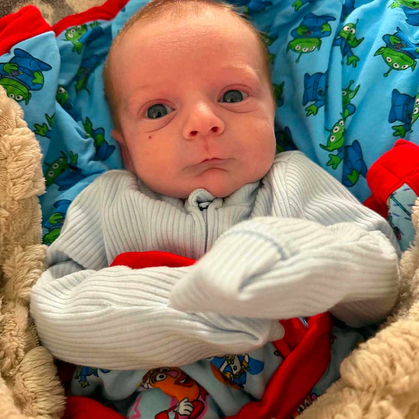 River joined the competition — help win amazing prizes! baby, infant, blanket, clothing, blue, red, pattern, frog, face, portrait, cozy, cute, expression, bundle, warm, soft, indoor, child, newborn, person