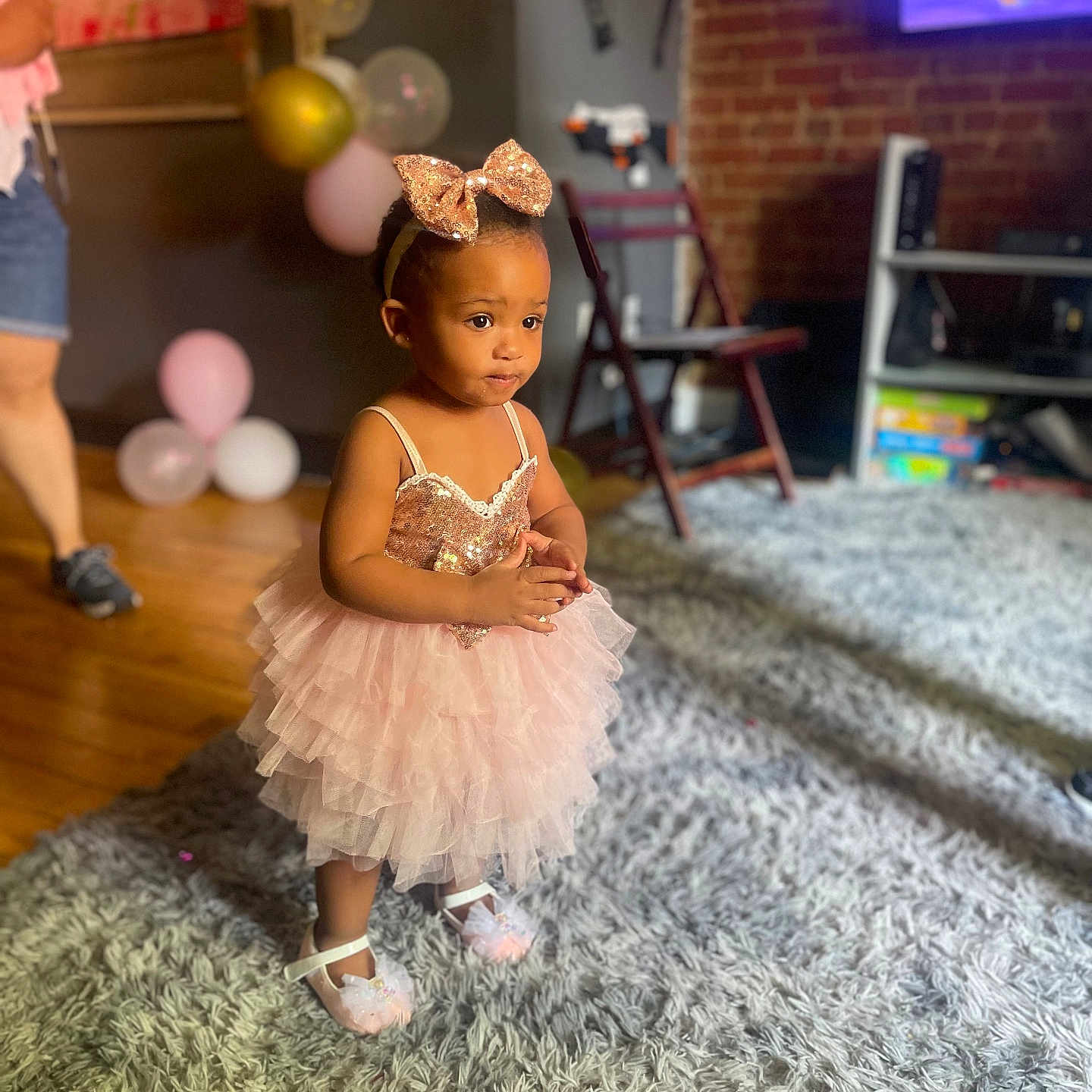 Anastasia joined the competition — help win amazing prizes! balloon, child, clothing, dress, face, female, footwear, formalwear, girl, head, people, person, photography, portrait, sandal, shoe, shorts, sitting, standing, wood
