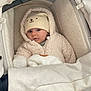 baby, infant, child, hat, fleece_jacket, stroller, blanket, cozy, warm, cute, face, portrait, soft, clothing, babywear, newborn, comfort, lying_down, bundle, cute_hat