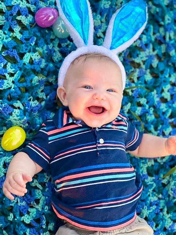 Carsyn is registered to the contest to win money with this photo: aqua, azure, baby, baby_toddler_clothing, blue, electric_blue, fun, grass, green, happy, light, pattern, people_in_nature, person, pink, purple, skin, sleeve, smile, textile