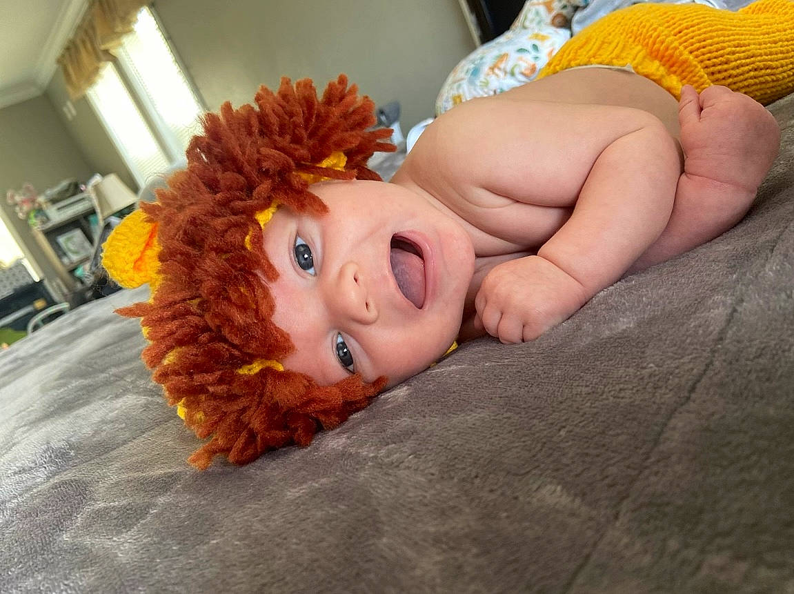 Kane joined the competition — help win amazing prizes! brown_hair, doll, eyelash, fashion_accessory, fawn, flooring, fur, happy, headband, headgear, headpiece, human_leg, jewellery, orange, person, petal, red_hair, thigh, toy, wig