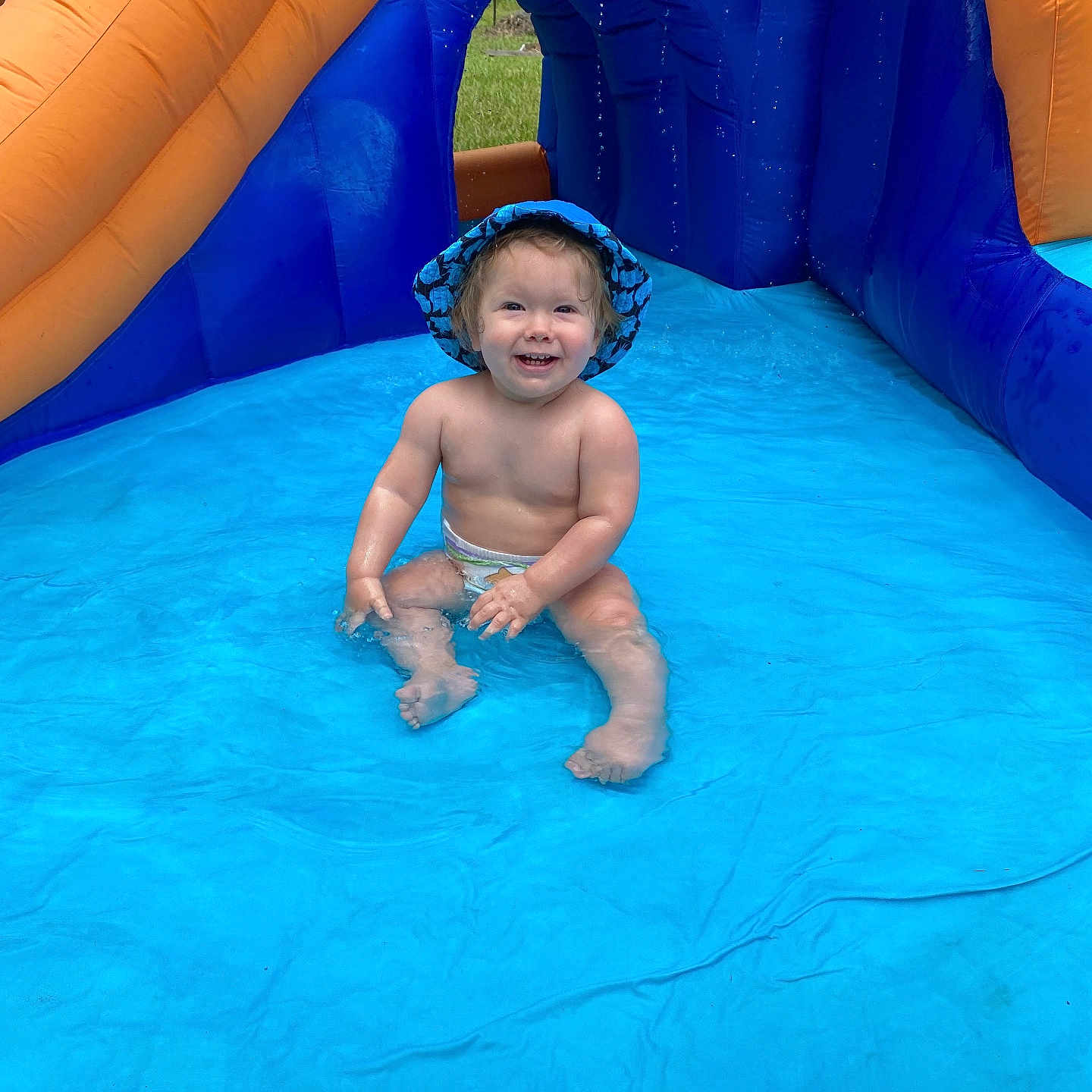 Oliver joined the competition — help win amazing prizes! amusementpark, baby, boy, child, clothing, face, hat, head, male, outdoors, person, photography, pool, portrait, slide, summer, swimmingpool, toy, water, waterpark