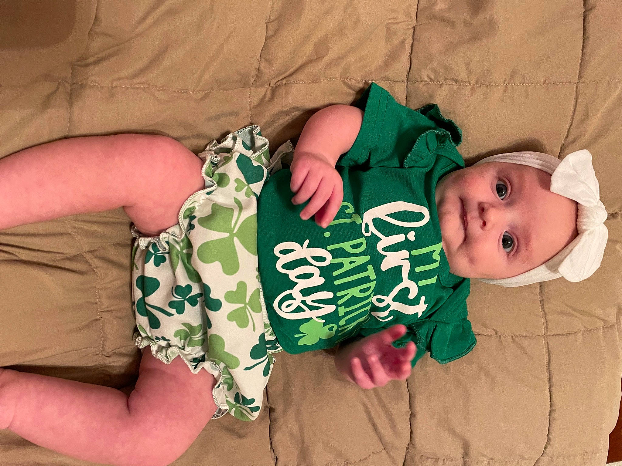 Scarlett joined the competition — help win amazing prizes! baby, baby_toddler_clothing, child, comfort, finger, grass, hand, happy, hat, nail, pattern, person, sitting, skin, sleeve, smile, t_shirt, textile, thumb, toddler