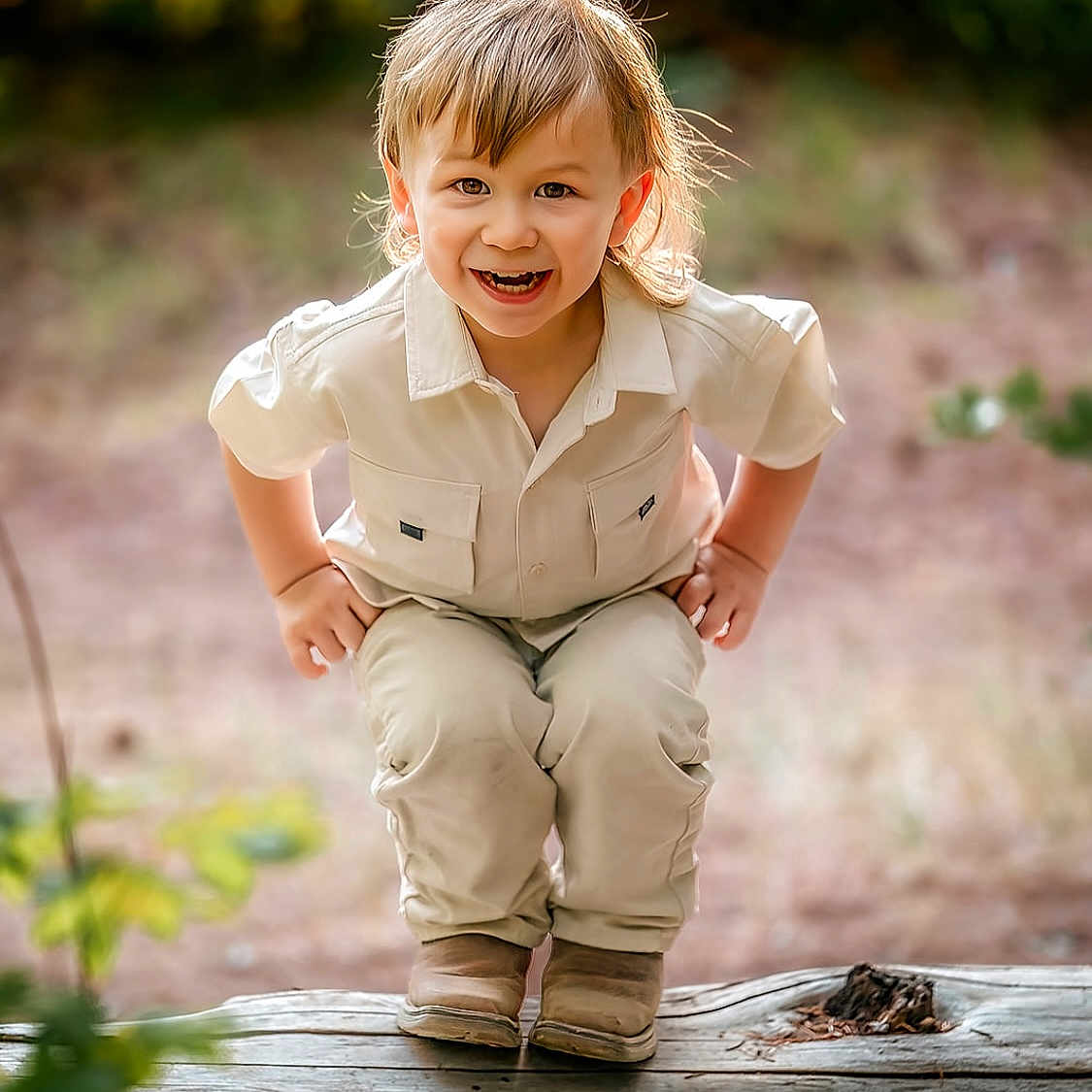 Casey Beau joined the competition — help win amazing prizes! boots, boy, candid, casual_clothing, child, cute, daylight, forest, fun, greenery, happy, log, nature, outdoor, playful, portrait, smiling, sunlight, tree, young