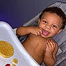 Messiah joined the competition — help win amazing prizes! toddler, child, high_chair, snack, banana, strawberry, waffle, food, happy, smiling, baby, cute, messy, indoor, person, face, eating, playful, seat, feeding