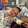 toddler, child, smiling, pajamas, blanket, couch, happy, face, indoors, cozy, soft, relaxed, home, person, baby, portrait, furniture, comfort, cute, young