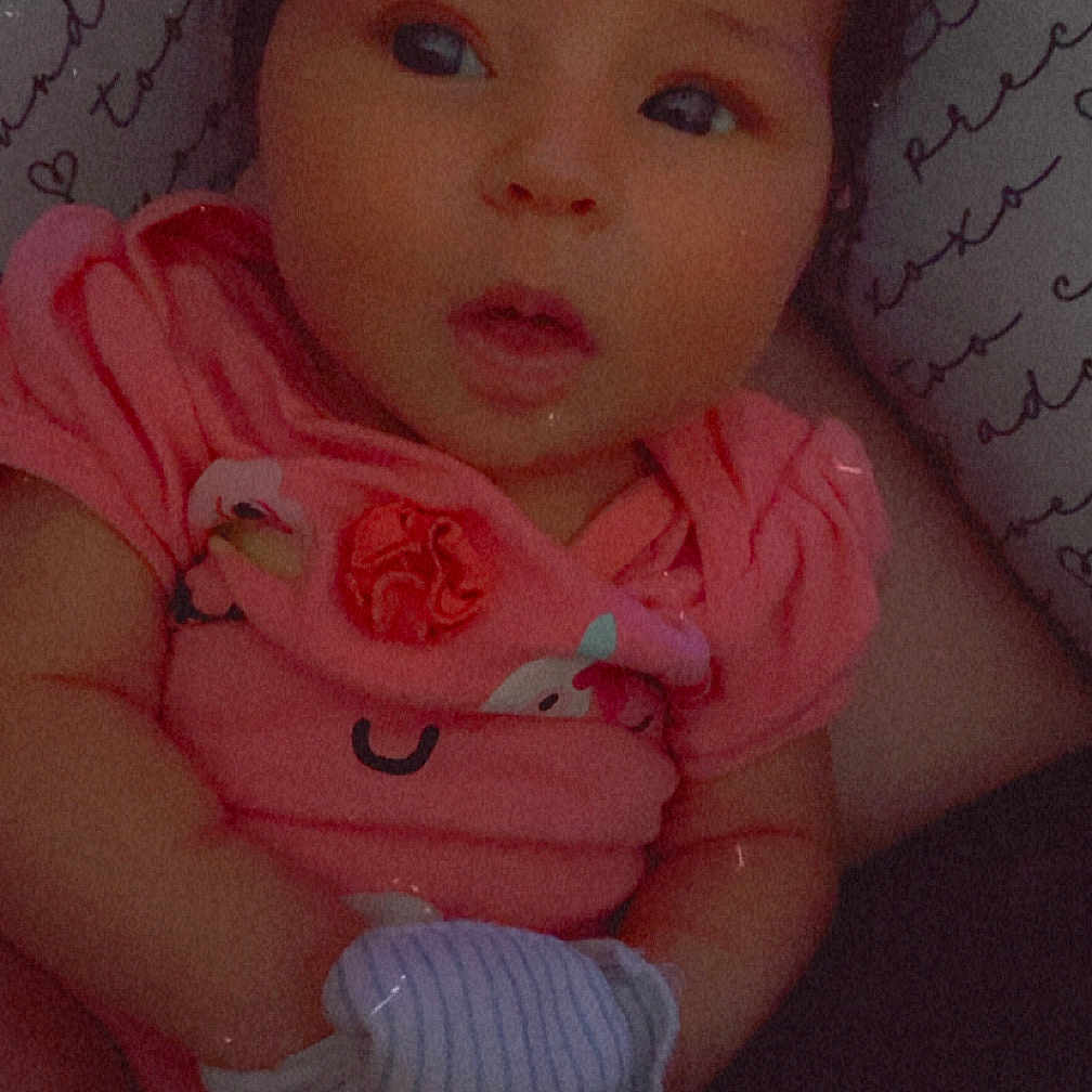 Harper Faye is registered to the contest to win money with this photo: baby, bed, bonnet, cap, clothing, cosmetics, couch, cushion, diaper, face, furniture, hat, head, homedecor, lipstick, newborn, person, photography, portrait, toy